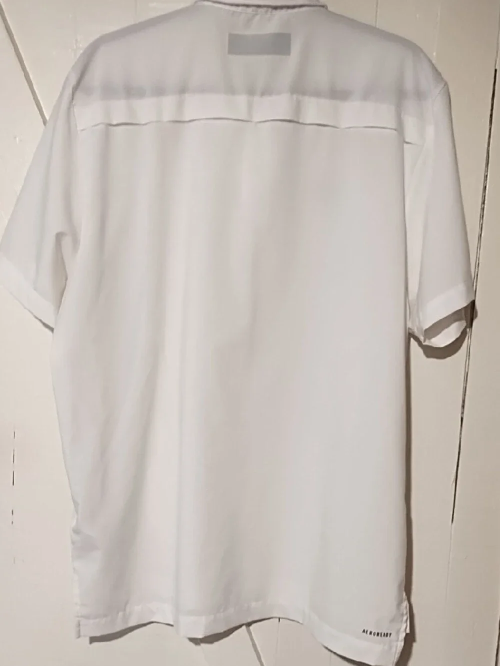 adidas EUC Medium AeroReady White Short-Sleeve Button Shirt with Black Logo.